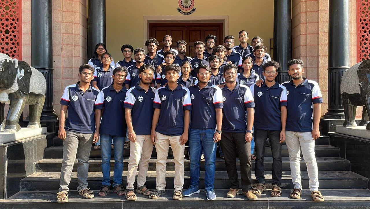 Student team wearing matching navy and white custom polos